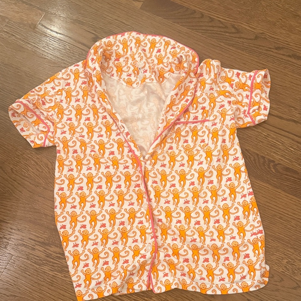 Roller Rabbit orange pajama set, size small, good condition.
